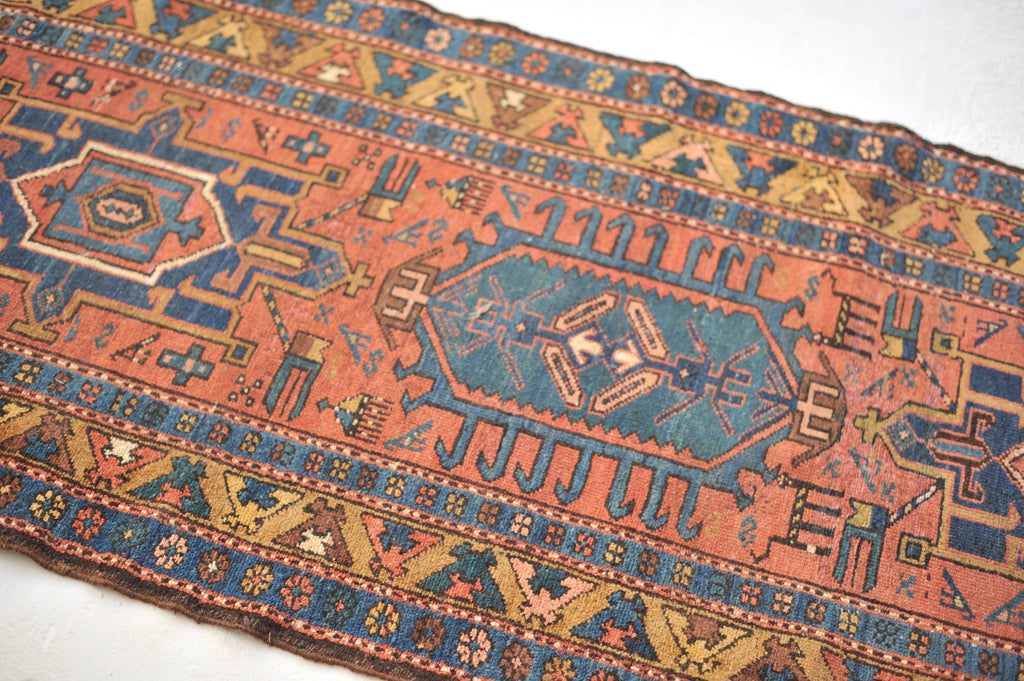 SOLD | WOW - Antique Northwest Runner | Deep Salmon-Terracotta Field with Camel Border | 3 x 10.8