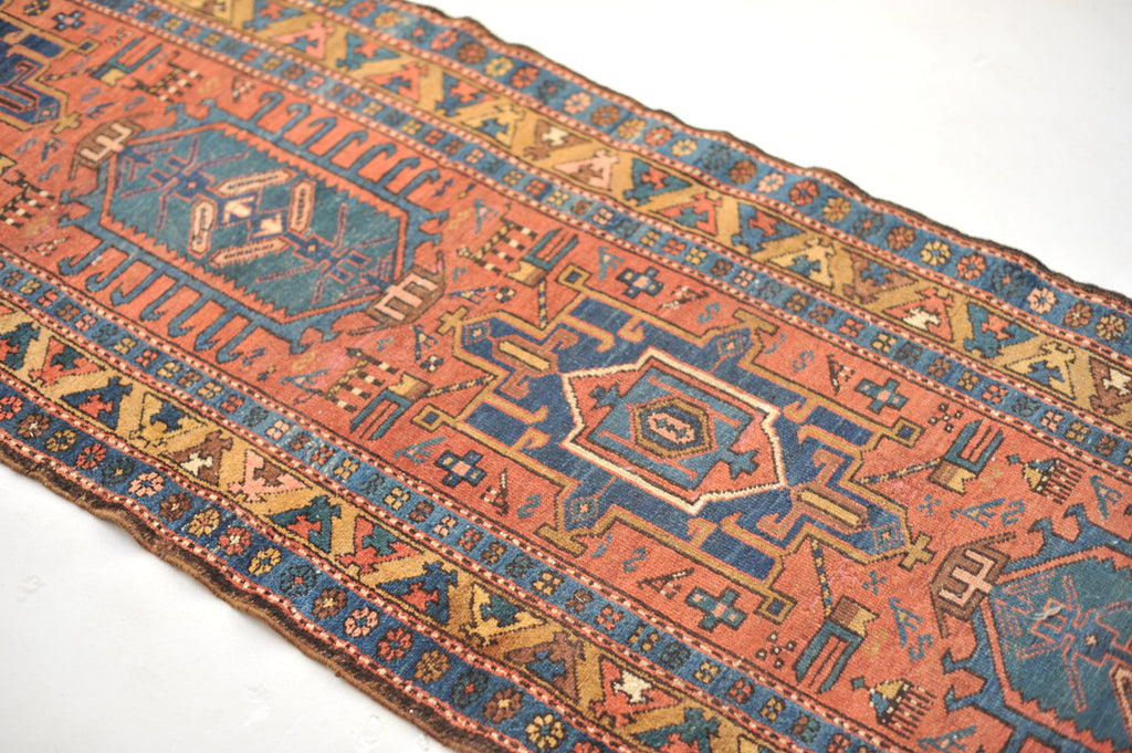 SOLD | WOW - Antique Northwest Runner | Deep Salmon-Terracotta Field with Camel Border | 3 x 10.8