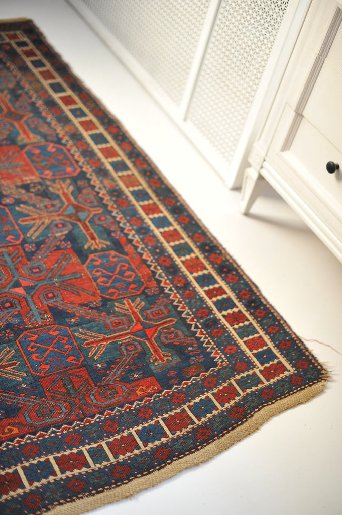 3.11 x 5.11 | Deep, Rich, and Moody Tribal Antique rug | Andy